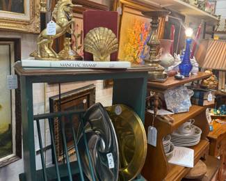 vintage hanging plate shelf, gorgeous brass figurines and book ends, cobalt blue glass