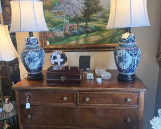 antique dresser, framed art, lamps