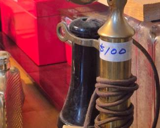 A candle stick brass telephone in working condition 