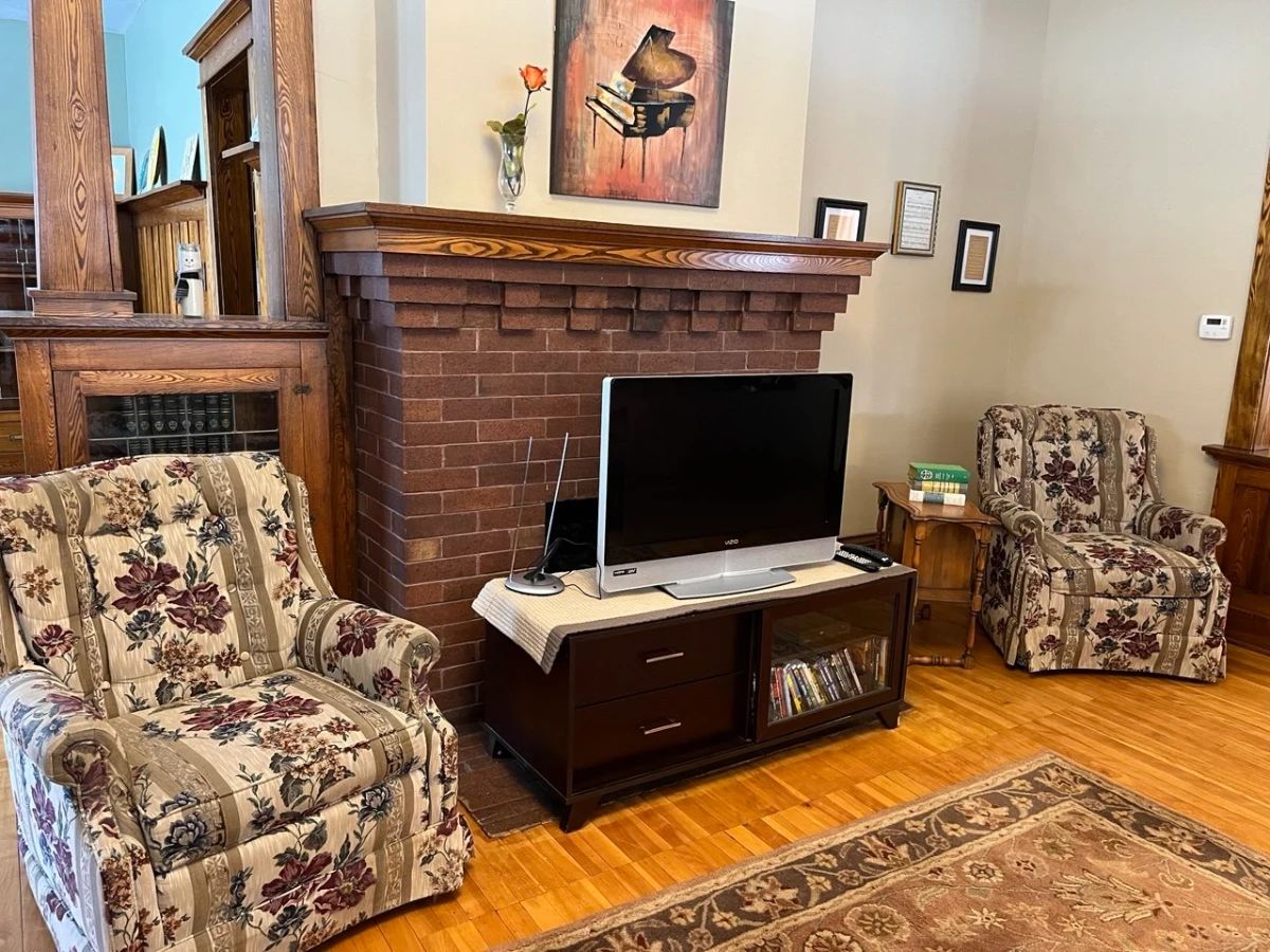 Chairs, tables, entertainment center 