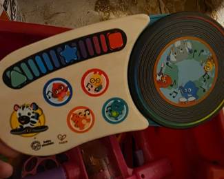 Lots of toys , many wooden