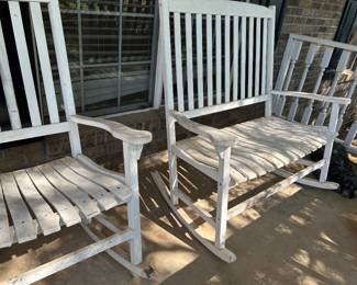 White wooden rocking chairs