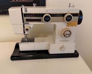 Vintage Nelco sewing machine with case and accessories