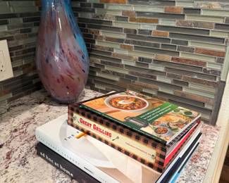 Cookbooks and vase