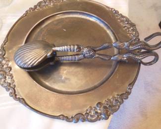brass serving plate and tongs