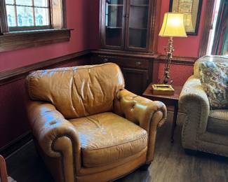 Perfectly worn leather armchair