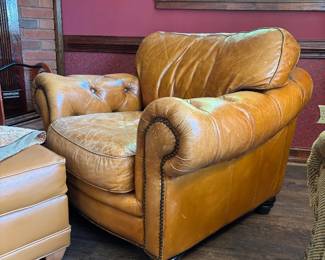 Perfectly worn leather armchair