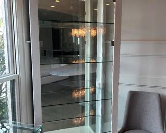 pair of lighted white display cabinets. 87”H x 35-1/2”W x 20” D