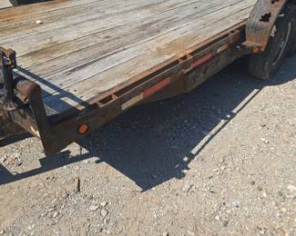 Tilt trailer with ramps