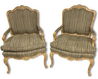 Pair Of French Louis XV Style Armchairs With Extravagant Carved Wood And Striped Upholstery