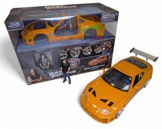 Two Jada Fast And Furious Brians Toyota Supra 1 24 Diecast Model Cars  One Sealed And One Built