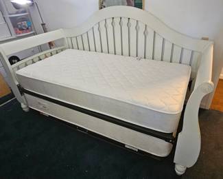 White wooden day bed/pull out trundle bed.