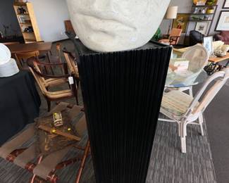 this stans is by Christopher Guy and the planter is cement ! 
