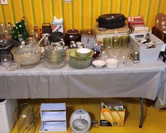 PYREX, sausage grinder, grease pot,  cookie cutters  Griswold cast iron frying pan, bread box, tin cracker box , bean pot, vintage soda bottles 