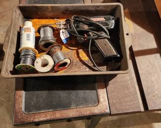 Soldering iron and solder