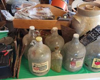 Battery chargers, cider and vinegar jugs