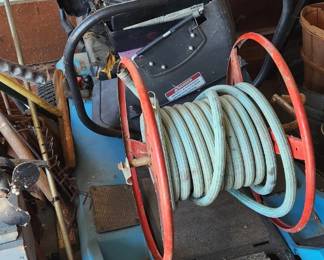 Vintage hose reel  Dixon Zeeter zero turn mower