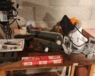 Drexel saw tool, compound mitre saw, drills press with bits and manual and shop table and misc tools