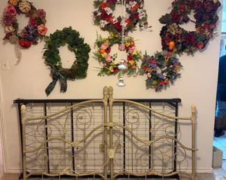 Wreaths and iron bed