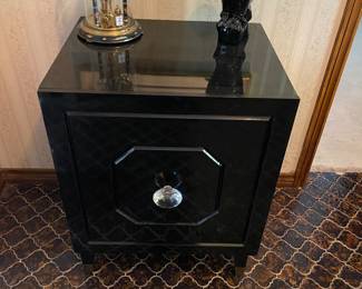Black high-gloss Angelo Jaslene Side Cabinet featuring an oversized acrylic knob