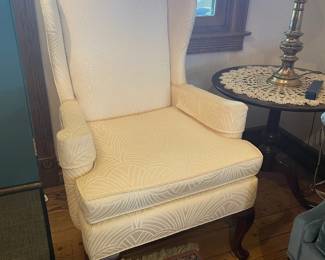 Wingback chair, cabriole legs with white palm frond pattern