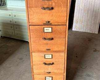 Vintage industrial oak four-drawer filing cabinet with metal hardware/label frames 