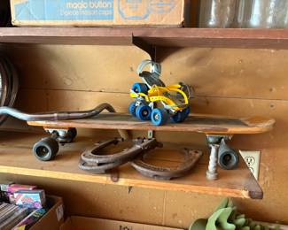 roller skates, skateboard, horse shoes
