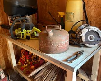 gas can, chain saw, Skill saw, sprayer,  wood stakes, work table