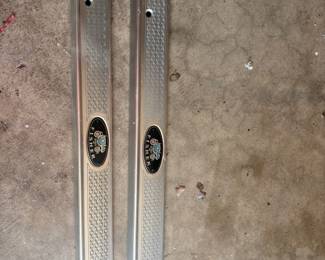 Door sill plates Fisher body coach emblem