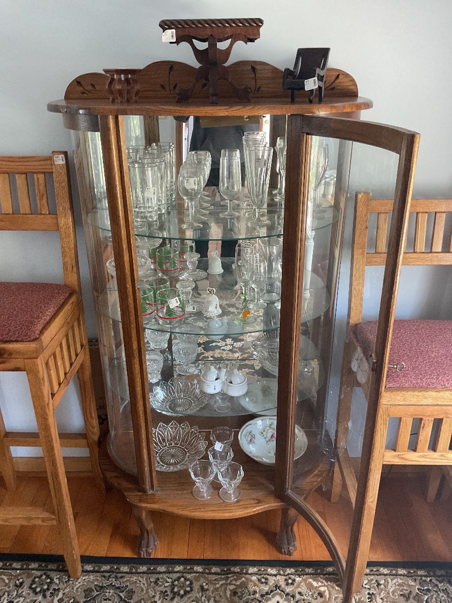 Lighted curio cabinet with glass shelves
