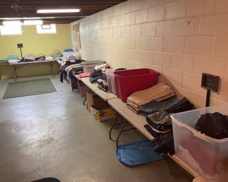 Lots of clothes, many unused.