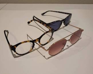 j Set of Two Stylish Eyeglasses and Sunglasses with Distinctive Frames