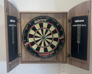 s Unicorn Champion Bristle Dartboard in Wood Cabinet with Scoreboards