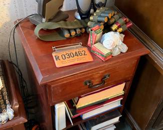 Shotgun shells, hunting license, night stand