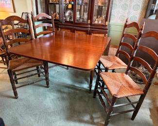 Beautiful antique drop leaf dining table with ladder back chairs