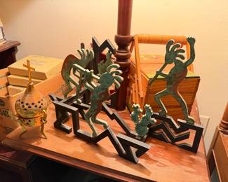 Kokopelli silhouette statues