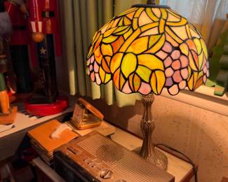 Vintage alarm clocks, stained glass lamp