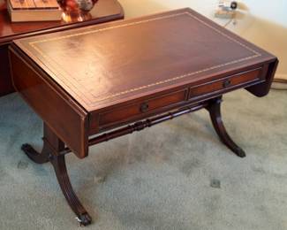 Beautiful leather top antique coffee table