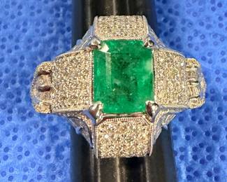 Very heavy platinum, diamond, and emerald ring