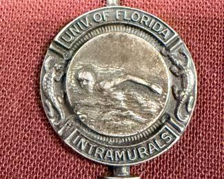 Sterling silver swimming metal from the 1960s university of Florida