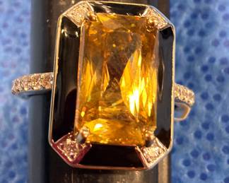 Sphere and Gold ring with diamonds 