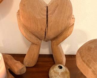 Eucalyptus wood sculpture of hands holding a heart