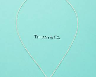 Tiffany & Co. Diamond Solitaire pendant on 16 inch platinum chain - Diamond (Color H; Clarity VS) - Total weight 3.6 grams
