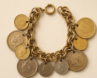 Gold tone bracelet with authentic French and Canadian coins