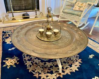 Moroccan brass tray table with unusual mid century modern base 38” w, 12” h