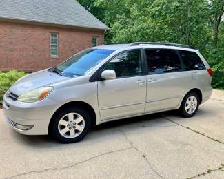 2004 Toyota Sienna minivan. 153,000 miles with very clean leather interior. Runs well.