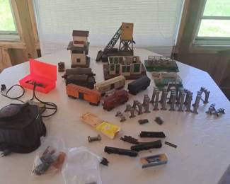 Collection Of Vintage Toy Trains And Buildings