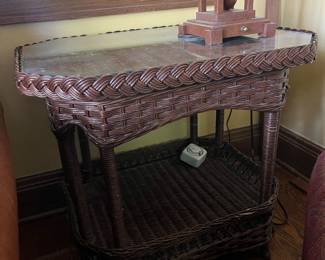 antique brown wicker side table