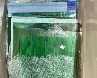 a few boxes of colored glass / slag glass for lighting and window projects and repairs