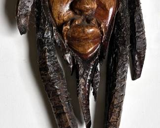 Mexican Hand Carved Wood Wall Sculpture & South American Ceramic Face Sculpture With Braids Lot #: 76